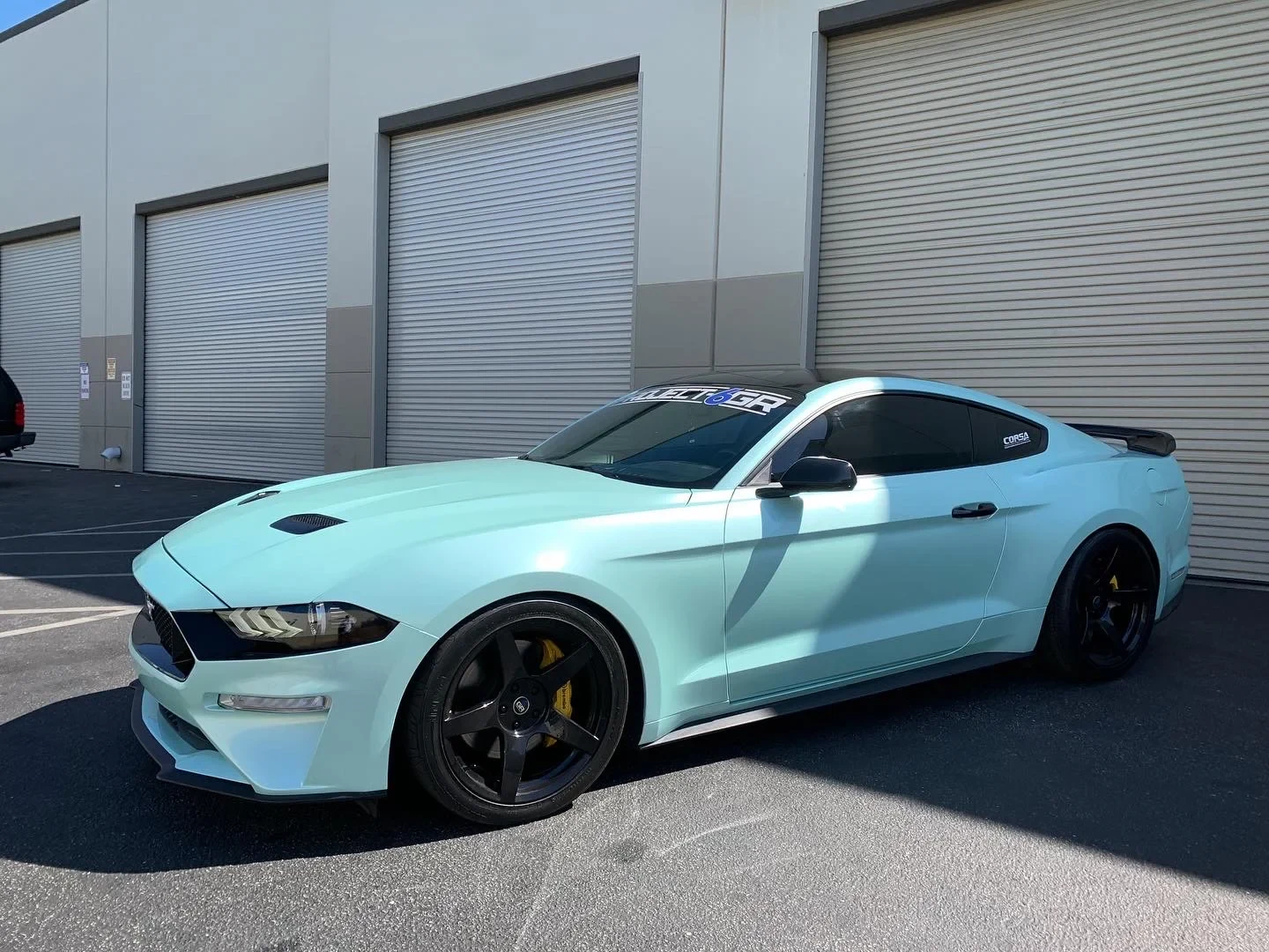 Light-blue Ford Mustang outside the Camarillo shop